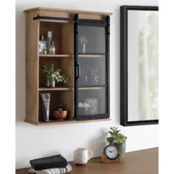 22" X 28" Barnhardt Decorative Wooden Wall Cabinet With Sliding Glass Door Rustic Brown - Kate & Laurel All Things Decor -Lamps and Lighting Store GUEST 219513b0 c922 46e5 b894 ffa14673e46b