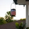7" Solar Patriotic Glass/Iron Hanging Lantern With LED Lights Cool White - Alpine Corporation 2 7" Solar Patriotic Glass/Iron Hanging Lantern With LED Lights Cool White - Alpine Corporation -Lamps and Lighting Store GUEST ea5fabbf e269 4528 9efc 6ce86c8413fb